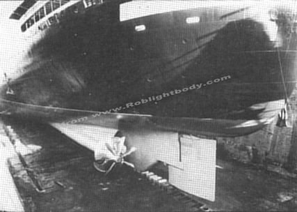 The underwater hull after coating with international paint's intersmooth HISOL.  You can also see the new propellors and Grim Wheels.
