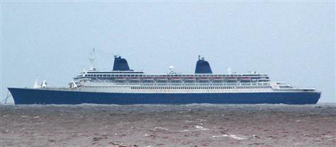 The Blue Lady, previously known as the SS France and SS Norway, is seen anchored off the Indian coast on Friday.