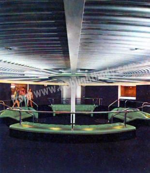 The main entrance of the ship, the Midships Lobby, was also designed by Lennon.